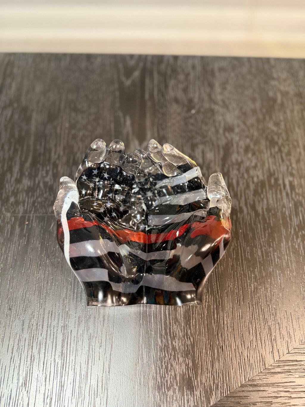 Cupped hands made of resin
